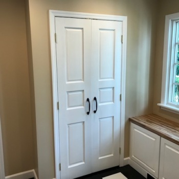 white doors with black handles